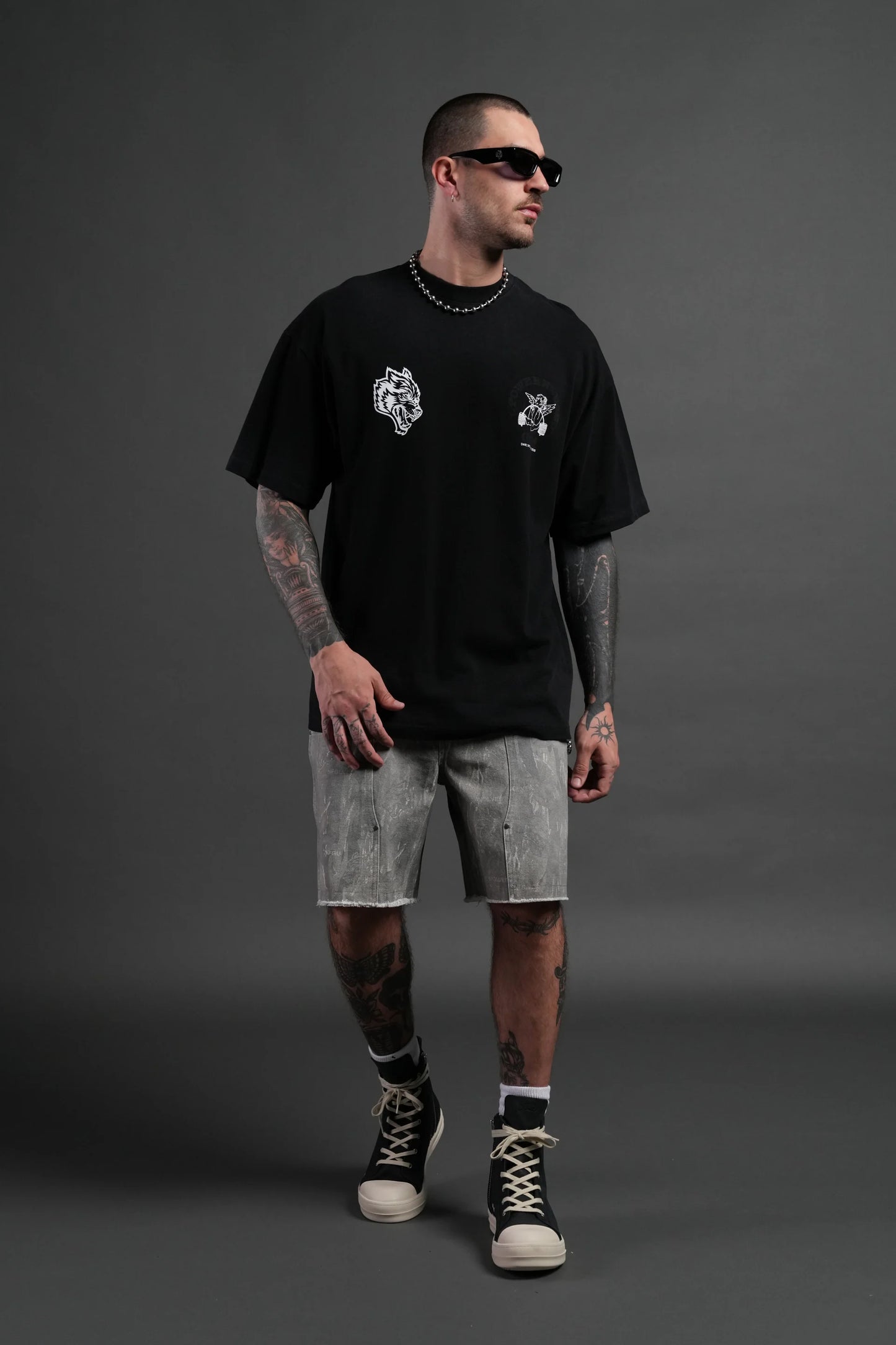 DS-0113 Powerhouse of the Cherub Unisex Premium Oversized Tee in Black Drift Wash