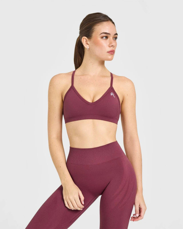 EnhanceLift™ Seamless Strappy Sports Bra with White Logo - Burnt Maroon